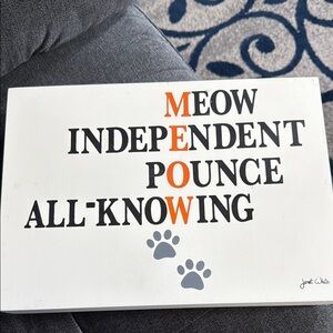 Cat Themed Wall Art with Orange and Black Text by Janet White.